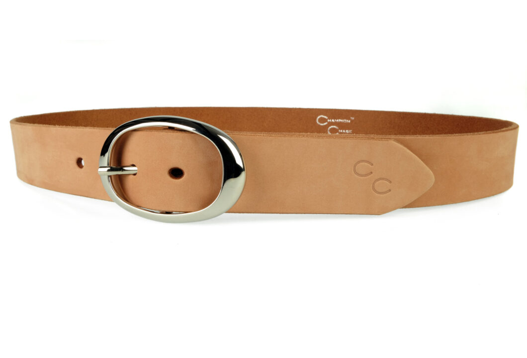 Nubuck Leather Belt With Oval Shaped Buckle Pastel Teracotta Leather. Shiny Nickel Wide Oval Shaped Buckle. Champion Chase Embossed Double Horse Shoe Motif. 4cm Wide. Leather thickness 3.5 to 4 mm.